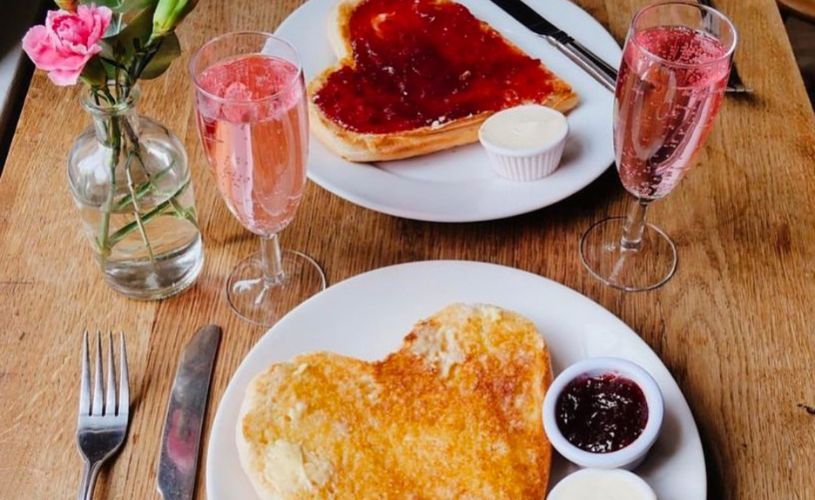 Heart-shaped buns and glasses of pink fizz